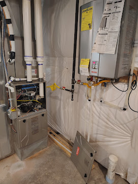 Complete HVAC system installation with furnace and water heater by On Time Heat & Air